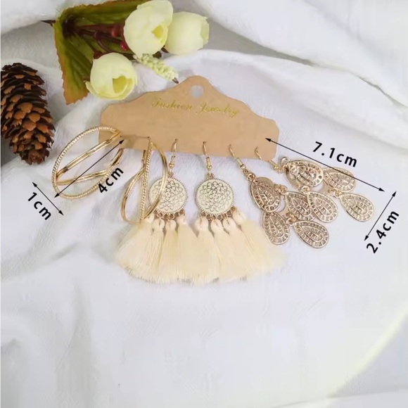 Gold and Cream Filigree Tassel Earrings
0431 - Picture 4 of 7